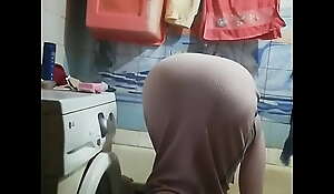 Maid washing clothes